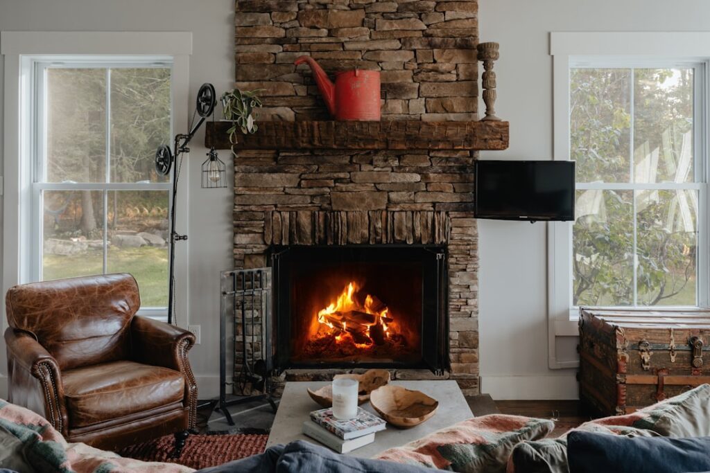 A living room with a portable heater set safely away from furniture and children playing nearby.